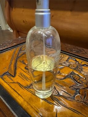 Estee Lauder pleasures 3.4 oz perfume about 1/2 full